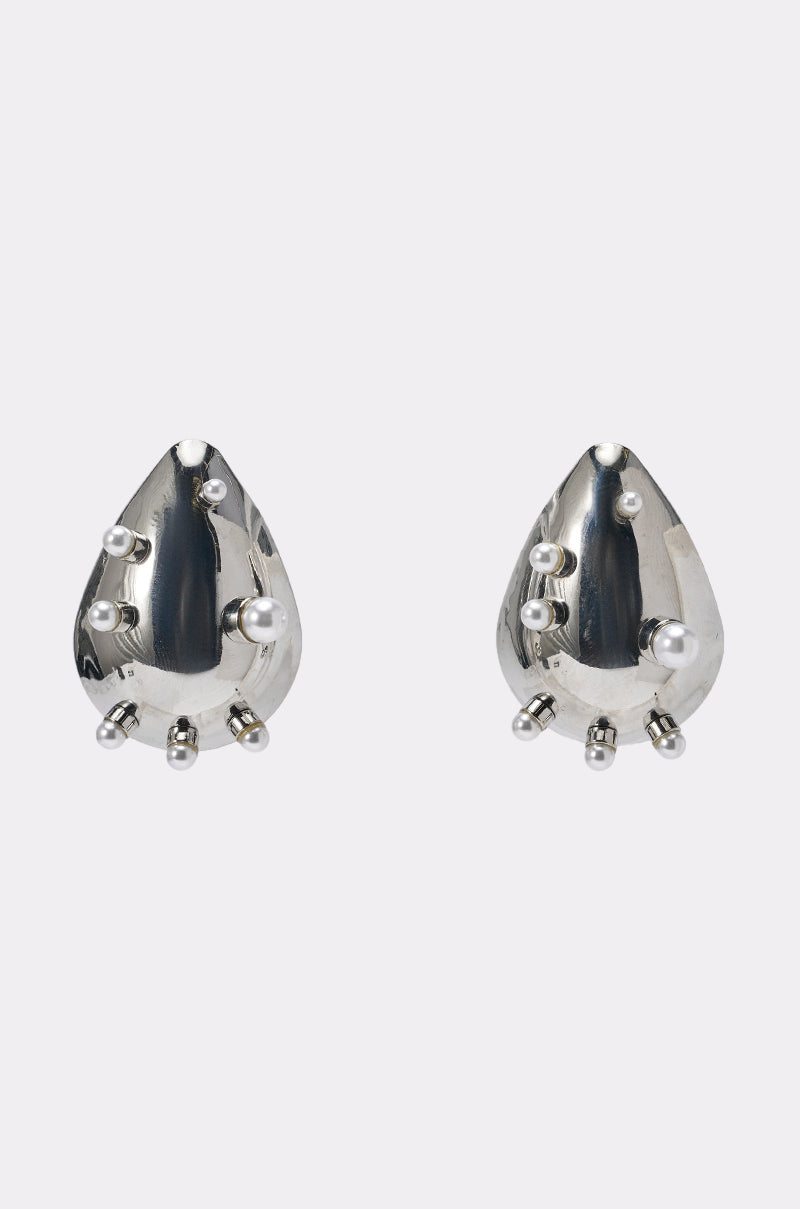 The DONT BE BOGUS EARRING is a pair of silver teardrop earrings with a shiny finish, featuring asymmetrically arranged round silver and pearl-like accents—perfect for statement earring enthusiasts. 0