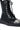 The AZALEA WANG PEMA BLACK FLAT BOOTIE is a combat-style boot crafted from black faux leather and highlighted by a thick geometric flatform sole. It showcases a silver metallic cap on the rounded toe, along with a lace-up front and sturdy metal eyelets.