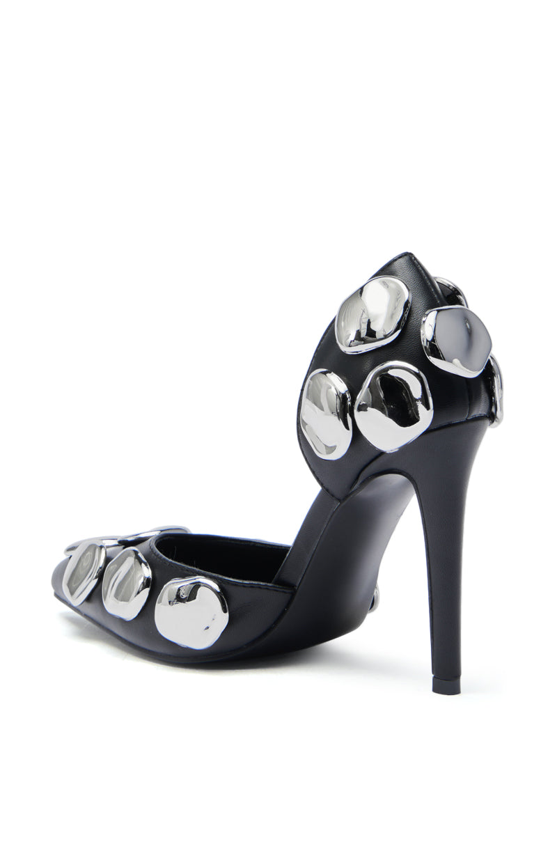 Step up your style in the AZALEA WANG PERLE black faux leather pump, featuring shiny silver metal embellishments, a pointed toe, and a tall stiletto heel—perfect for elevating your look.