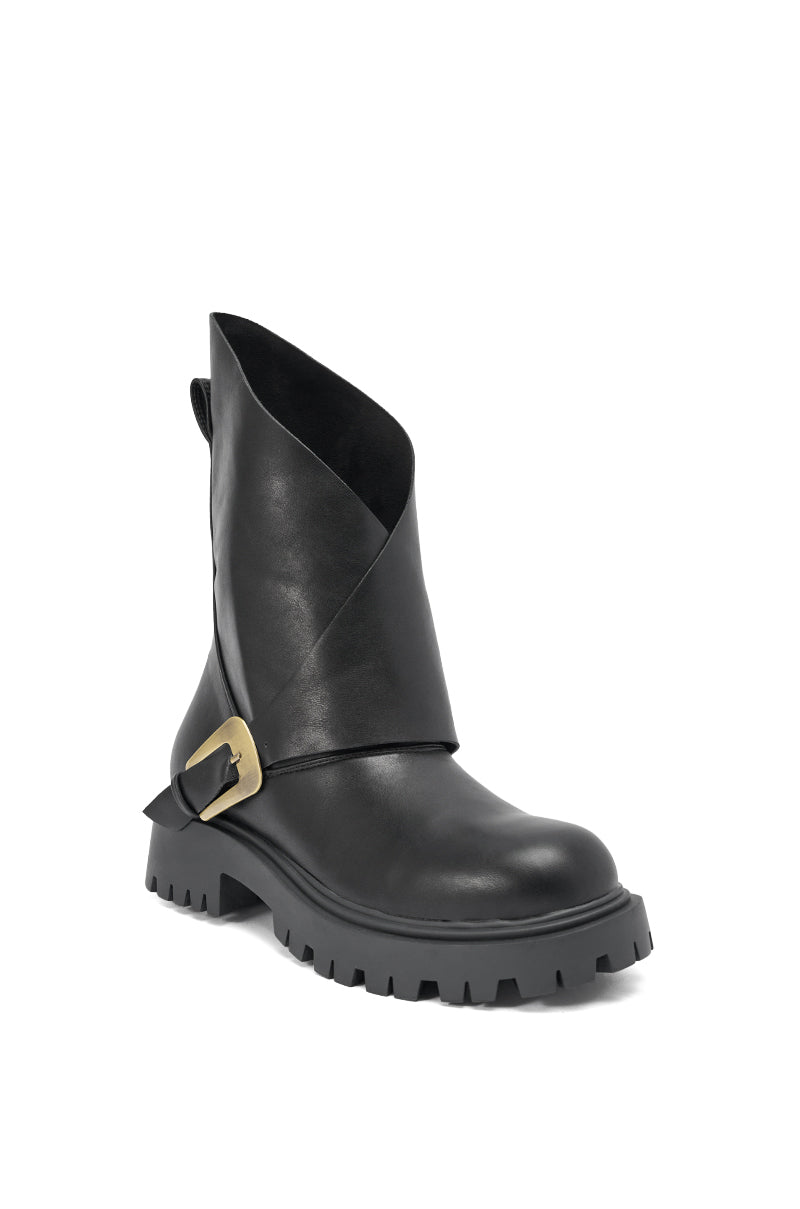 The AZALEA WANG PHRIXUS BLACK CHUNKY SHORT SHAFT PU BOOT is a faux leather mid-calf boot with an asymmetric folded upper and a side gold buckle accent.