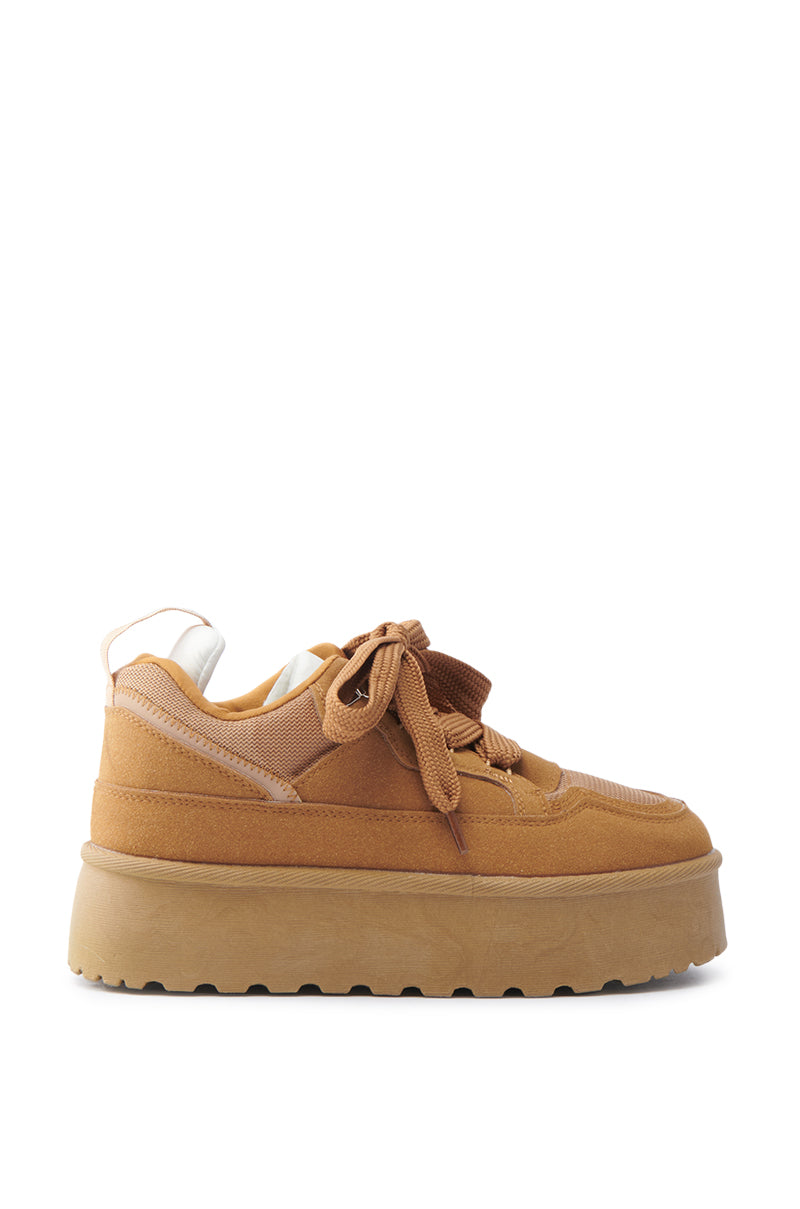 Side view of the POPULARITY CHESTNUT FLATFORM SNEAKER, showcasing its suede upper, chestnut tone, thick sole, and large laces.