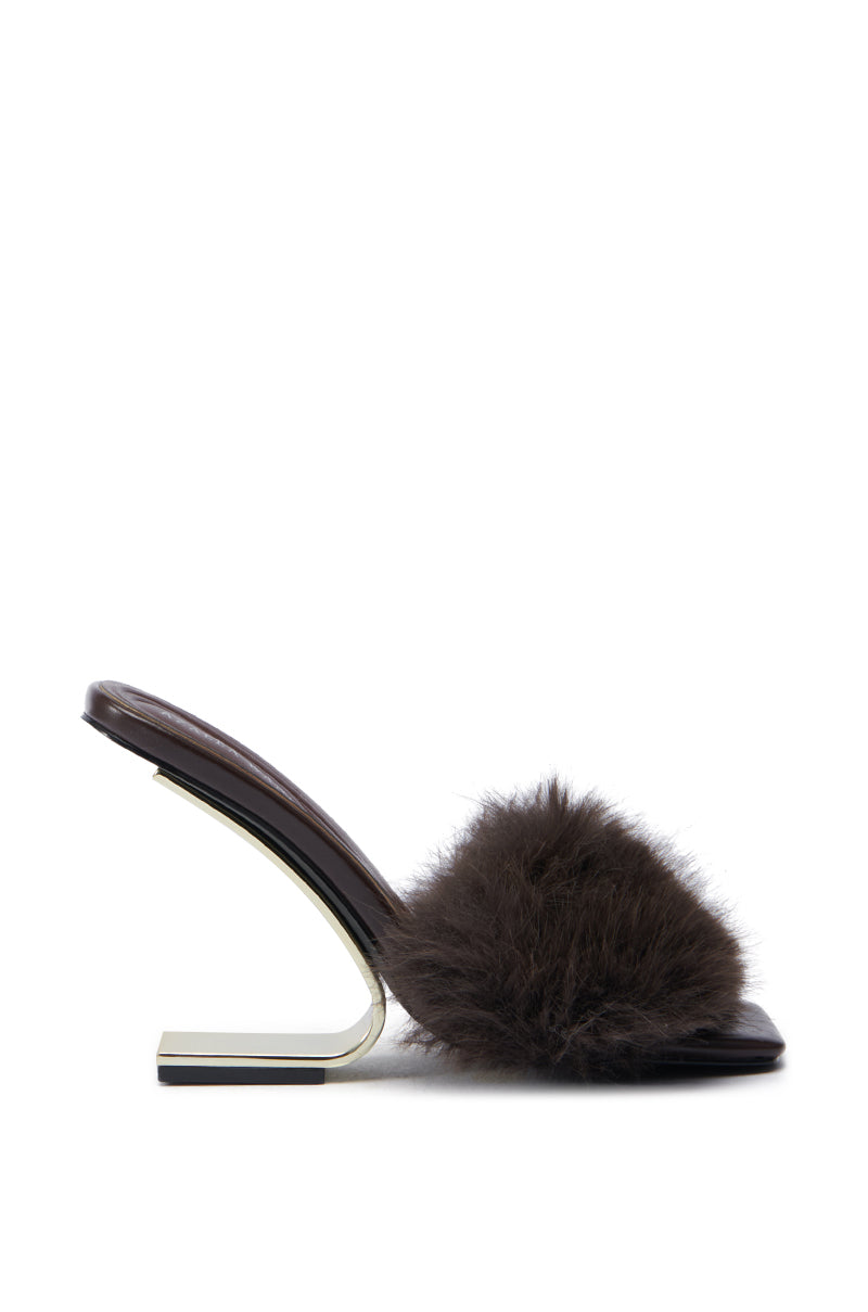 Introducing the AZALEA WANG PUPON BROWN FUR SANDAL, showcasing a side view of its sleek design. This faux leather sandal features a modern wedge heel and is adorned with a plush, dark fur-like strap over the front. It combines contemporary aesthetics with comfort through its cushioned insole for all-day wearability.