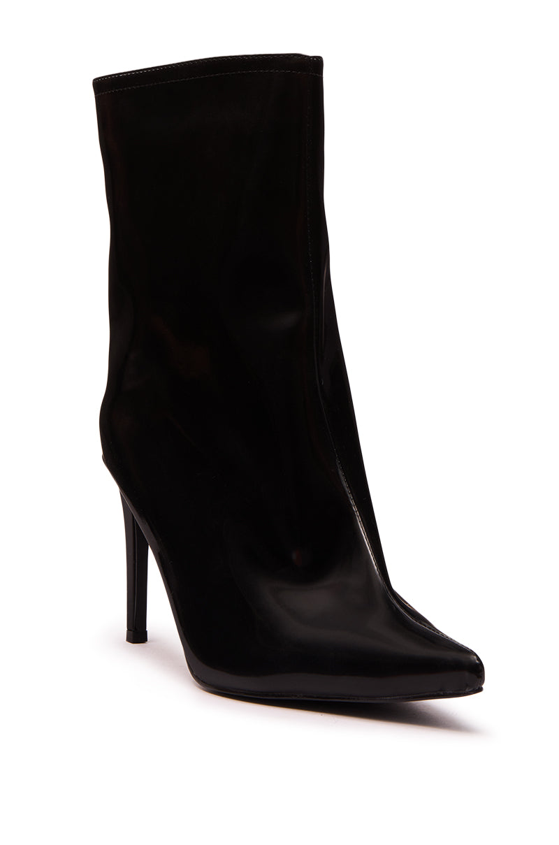 The AZALEA WANG QUINNTA BLACK BOOTIE is a sleek stiletto heel bootie with a pointed toe and glossy faux patent leather finish, shown at a slight angle against a white background.