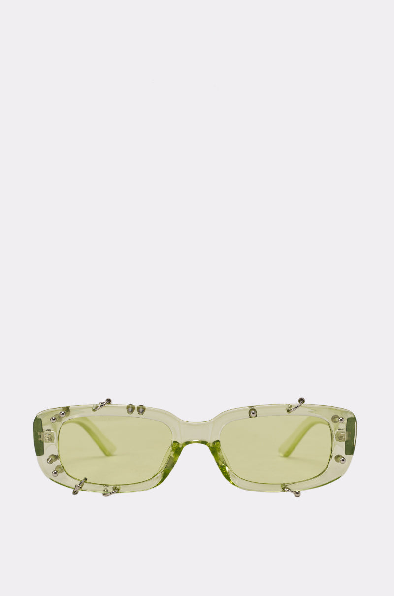 WITH A TWIST SUNGLASSES: Rectangular, translucent green sunglasses with small silver studs along the frame, displayed on a plain white background—ideal for making a bold statement. 0