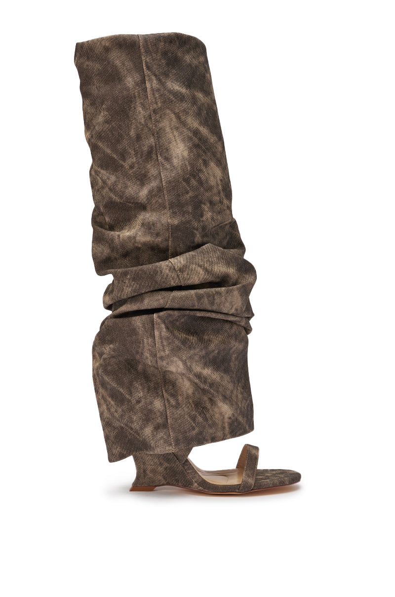 The AZALEA WANG BROWN ACID WASHED DENIM GLADIATOR SANDAL is a single wedge sandal with an attached, oversized, slouchy knee-high boot in matching mottled brown and gray acid-washed denim. 3