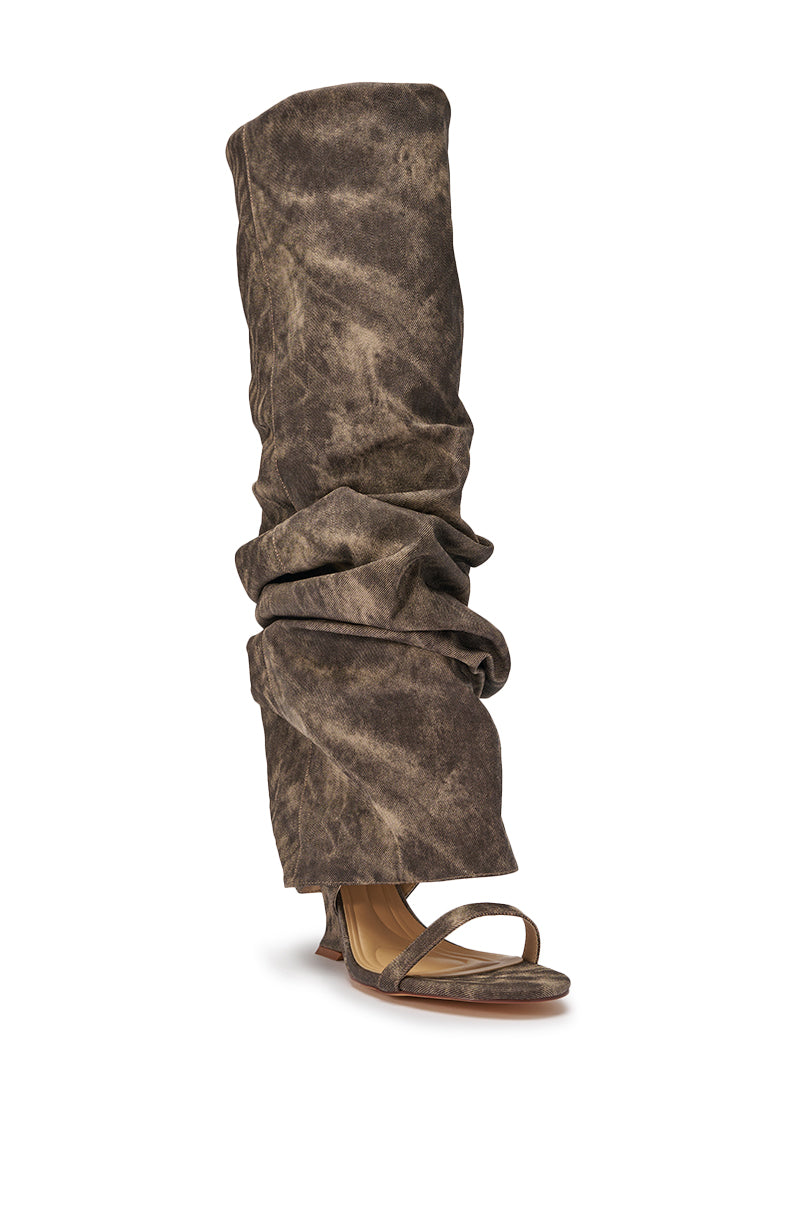 The AZALEA WANG Brown Acid Washed Denim Gladiator Sandal features a slouchy, knee-high silhouette with distressed brown denim, an open toe, thin heel, and a scrunched shaft for a bold statement look. 4