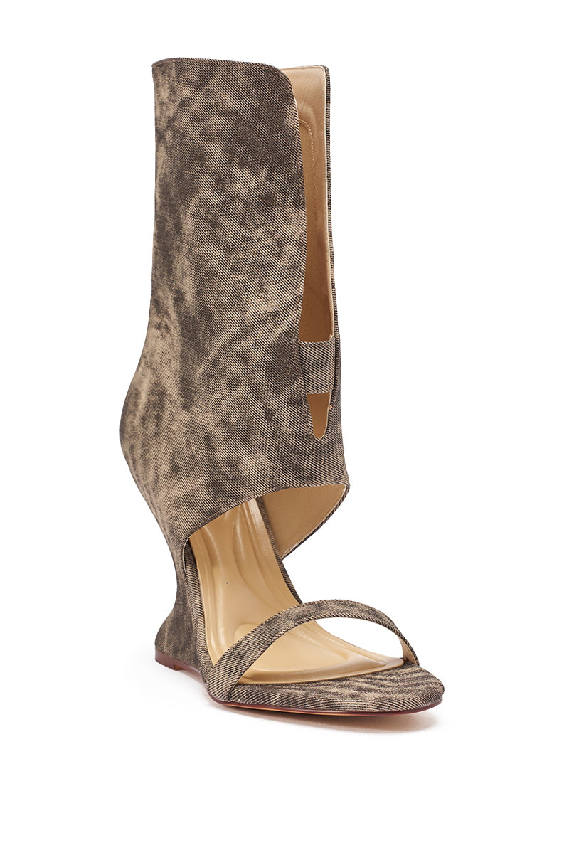 The AKIRA GOLD RAFFAELLO BROWN WOVEN ROUND TOE WEDGE SANDAL features a sculptural brown faux-leather upper, open toe, single front strap, unique inverted wedge heel, curved high ankle cutouts, and a tan footbed. 4