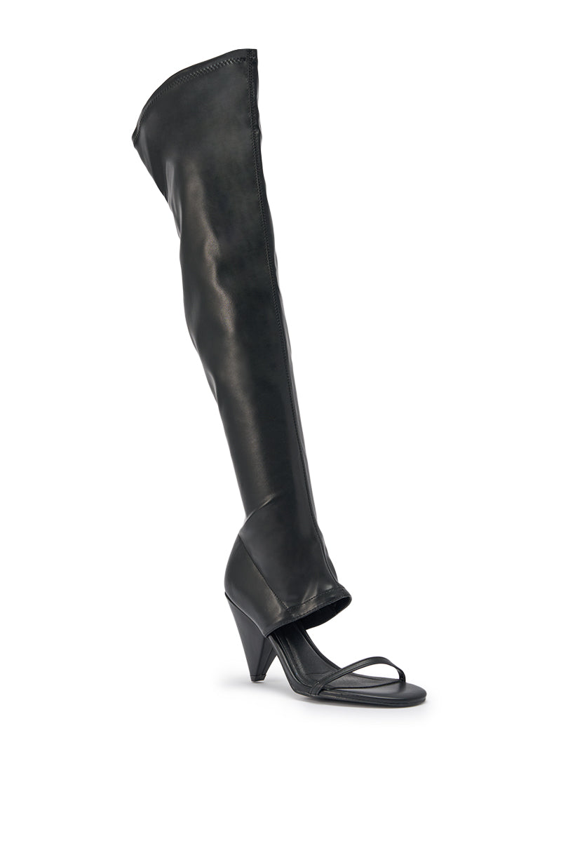 The AZALEA WANG RAGNAR BLACK CHUNKY STRETCH PU OVER THE KNEE BOOT features an open toe, sandal front, tall shaft, chunky block heel, and minimalist straps for a bold, modern look. 5