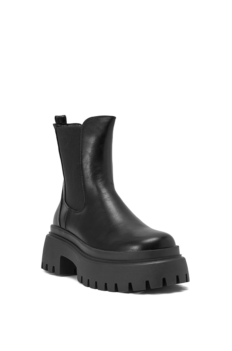 The AZALEA WANG RAMPAGE BLACK DISTRESSED TWO PIECE COMBAT BOOT features a chunky platform lug sole, thick tread, elastic side panels, and a back pull tab in black faux leather. 8
