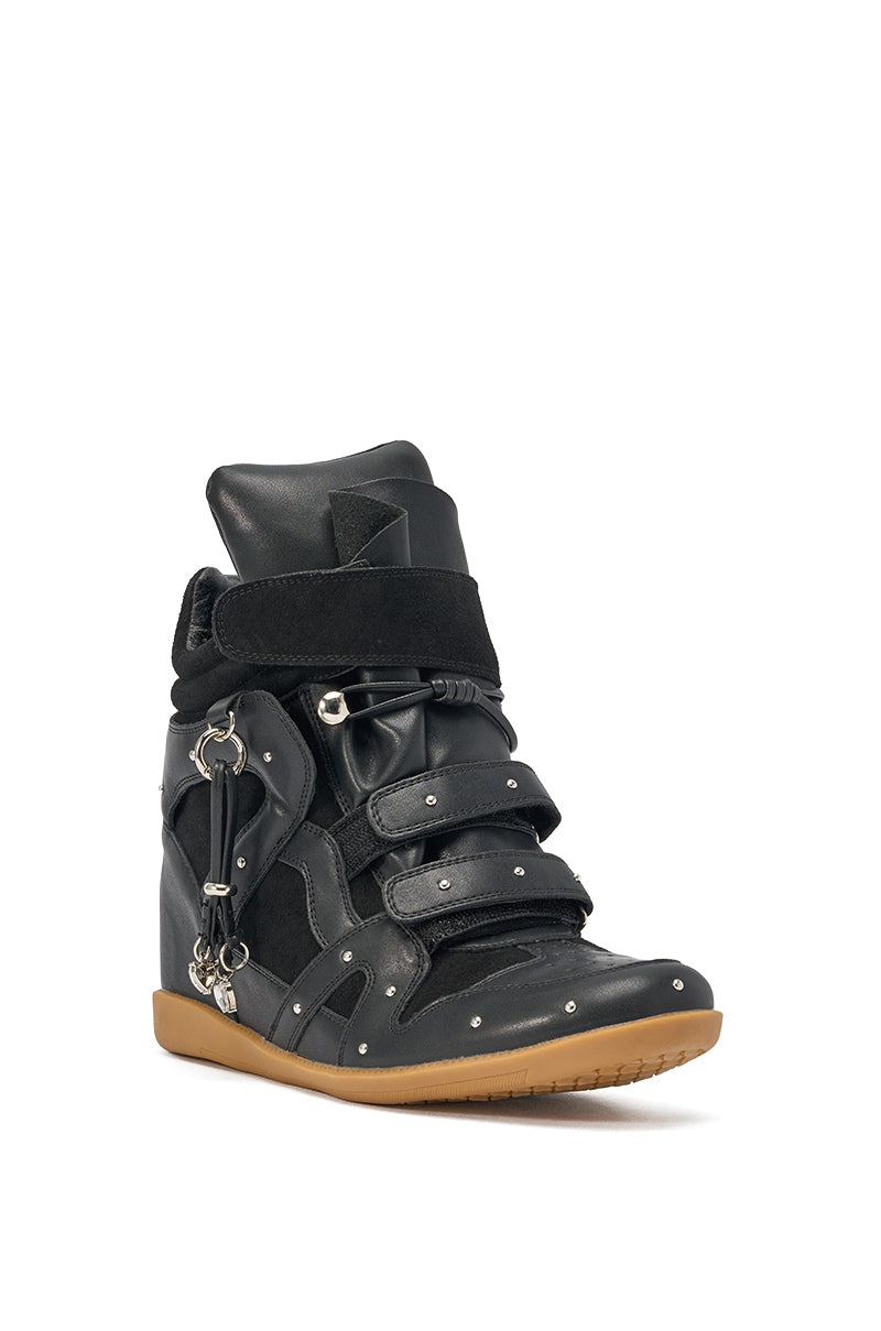 The AKIRA GOLD RANGELEY Black Silver Hardware Embellished Wedge Sneaker features multiple Velcro straps, silver metal studs, suede and faux leather uppers, side metal hardware, and a light brown rubber sole. 3