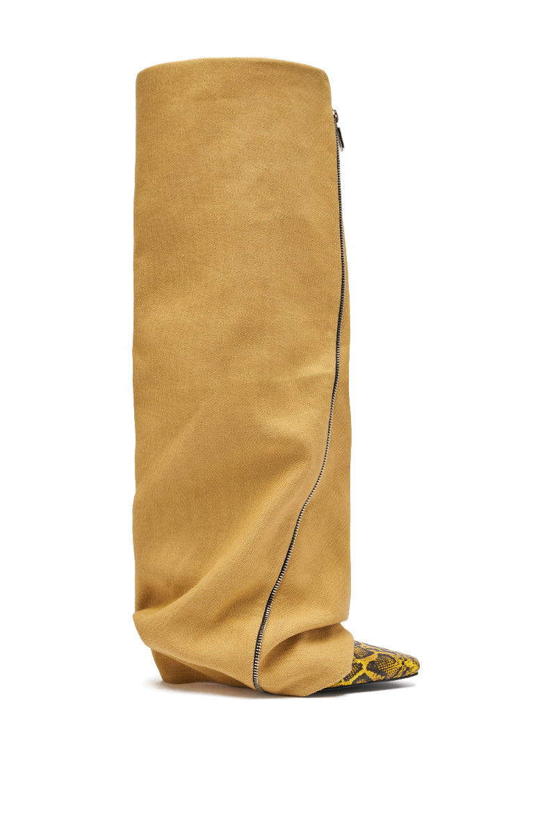 The AKIRA GOLD RASHAWN KHAKI AND SNAKE BOOT is a tall, slouchy over-the-knee boot in mustard yellow with a yellow and black snakeskin pattern, visible side zipper, and pointed toe. 3