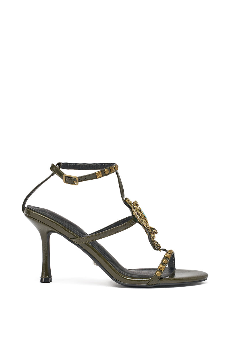 The AZALEA WANG REPUTATION OLIVE PU EMBELLISHED STILETO SANDAL features an olive hue, ankle strap, gold stud accents, and ornate gold embellishment on the front strap, displayed against a white background. 3