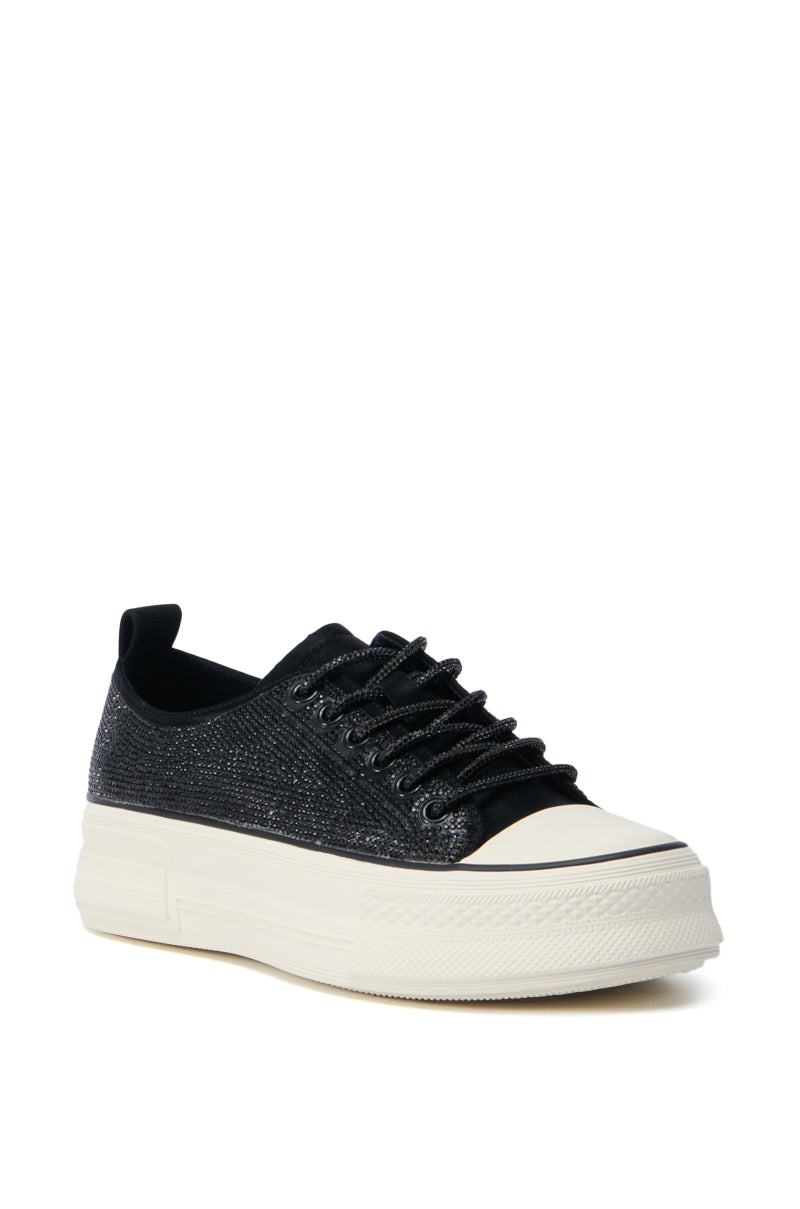The AZALEA WANG Revival Black Rhinestone Flatform Sneaker, with a faux leather upper and black laces, stylishly showcases its cream-colored thick sole while displayed at a slight angle on a white background.