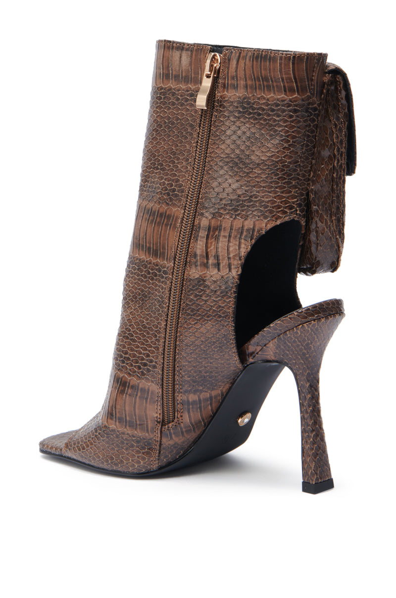 The AZALEA WANG RIDWAN BROWN OPEN TOE BOOTIE features a brown snakeskin texture, pointed toe, stiletto heel, side zipper, and a unique boot-sandal hybrid design with an open heel. 5