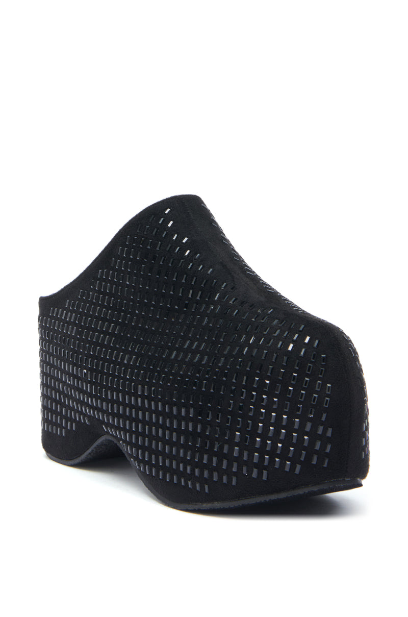 The AZALEA WANG ROMESCO BLING FLATFORM CLOG IN BLACK is a black closed-toe flatform featuring a sculptural shape, square grid cutouts, thick sole, and comfort cushion insole for an avant-garde take on modern style.