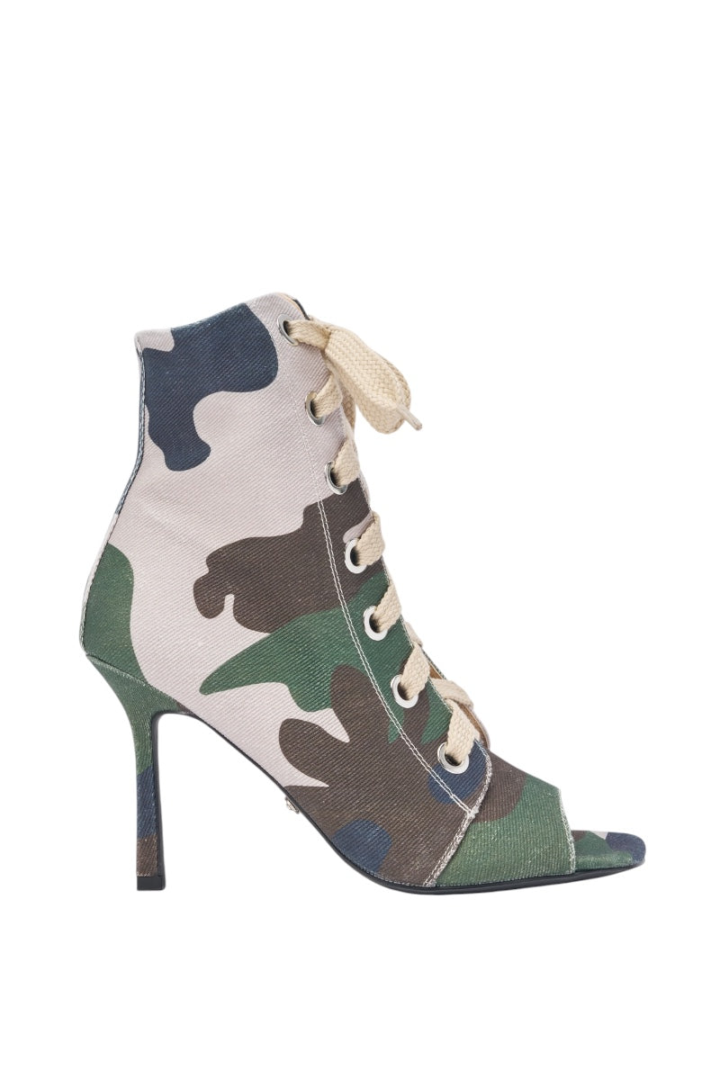The AZALEA WANG ROOFTOP CAMO OPEN TOE LACE UP BOOTIE is a high-heeled stiletto bootie with open toes, canvas construction, and a green, brown, tan, and black camouflage print. 3