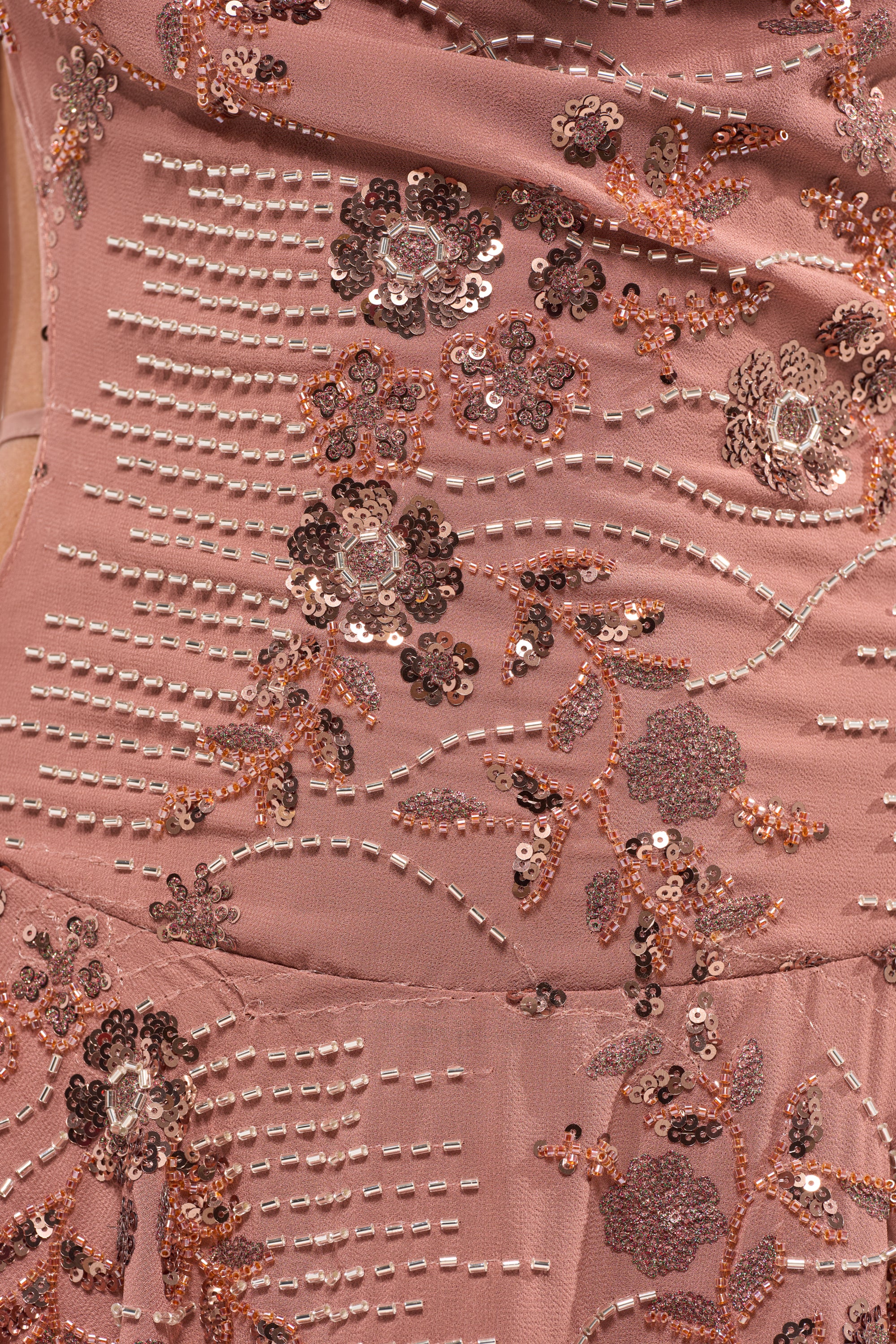 Close-up of the FELICITY EMBELLISHED MINI DRESS IN BROWN, showcasing detailed floral embroidery, sequin beadwork, and metallic accents—ideal for a chic cocktail party look. 9