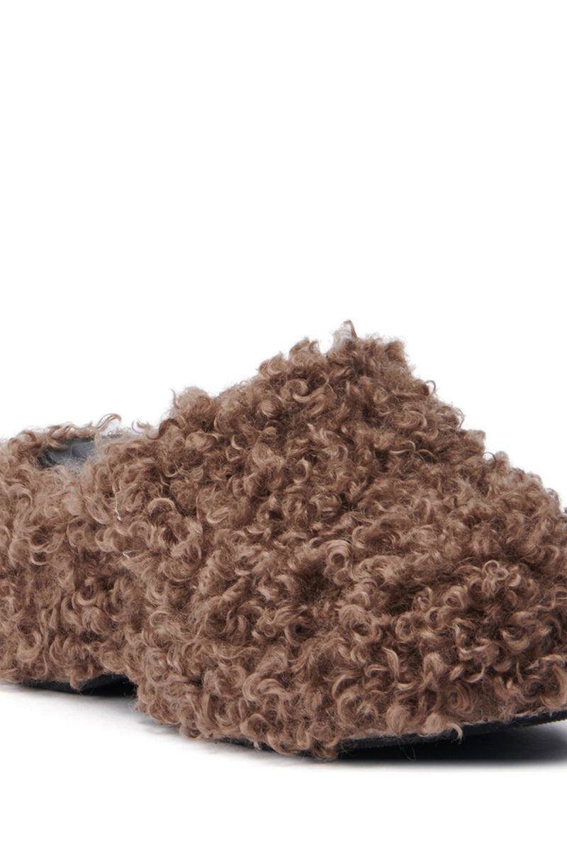 Introducing the AZALEA WANG RUPERBT BROWN CURLY MULE: a closed-toe, open-back slipper with a fur-textured, woolly appearance in brown. Its soft faux fur upper design is set against a plain white background, seamlessly combining comfort and style. 5