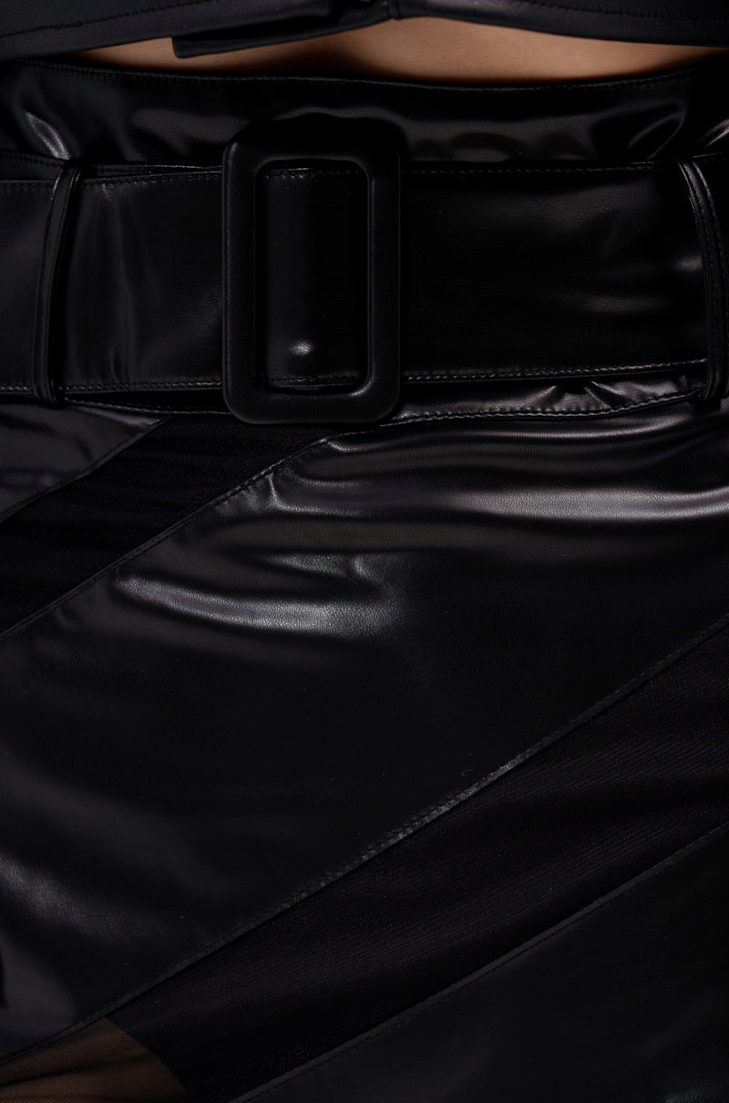 Close-up of the SOMETHING DIFFERENT MESH MIDI SKIRT WITH FAUX LEATHER, featuring a high-waisted fit, wide rectangular buckle belt, visible panel stitching, and sleek textured faux leather for an edgy look.