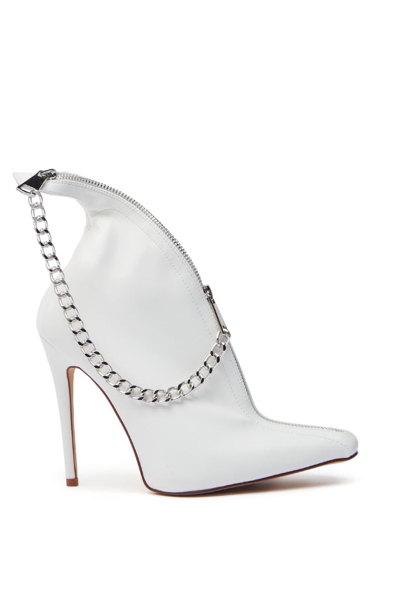 The AZALEA WANG SAGITTA WHITE STILETTO PUMP features a dramatic pointed toe, metallic chain hardware, and a back zipper detail. This faux leather boot boasts a wooden-finished heel that contrasts its sleek texture.