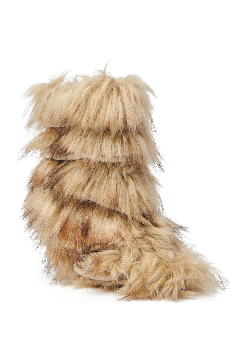 The AZALEA WANG SALERE BROWN ROPE DETAIL STILETTO BOOTIE features high heels and long, shaggy light brown and tan faux fur, giving it a textured look that resembles animal fur.
