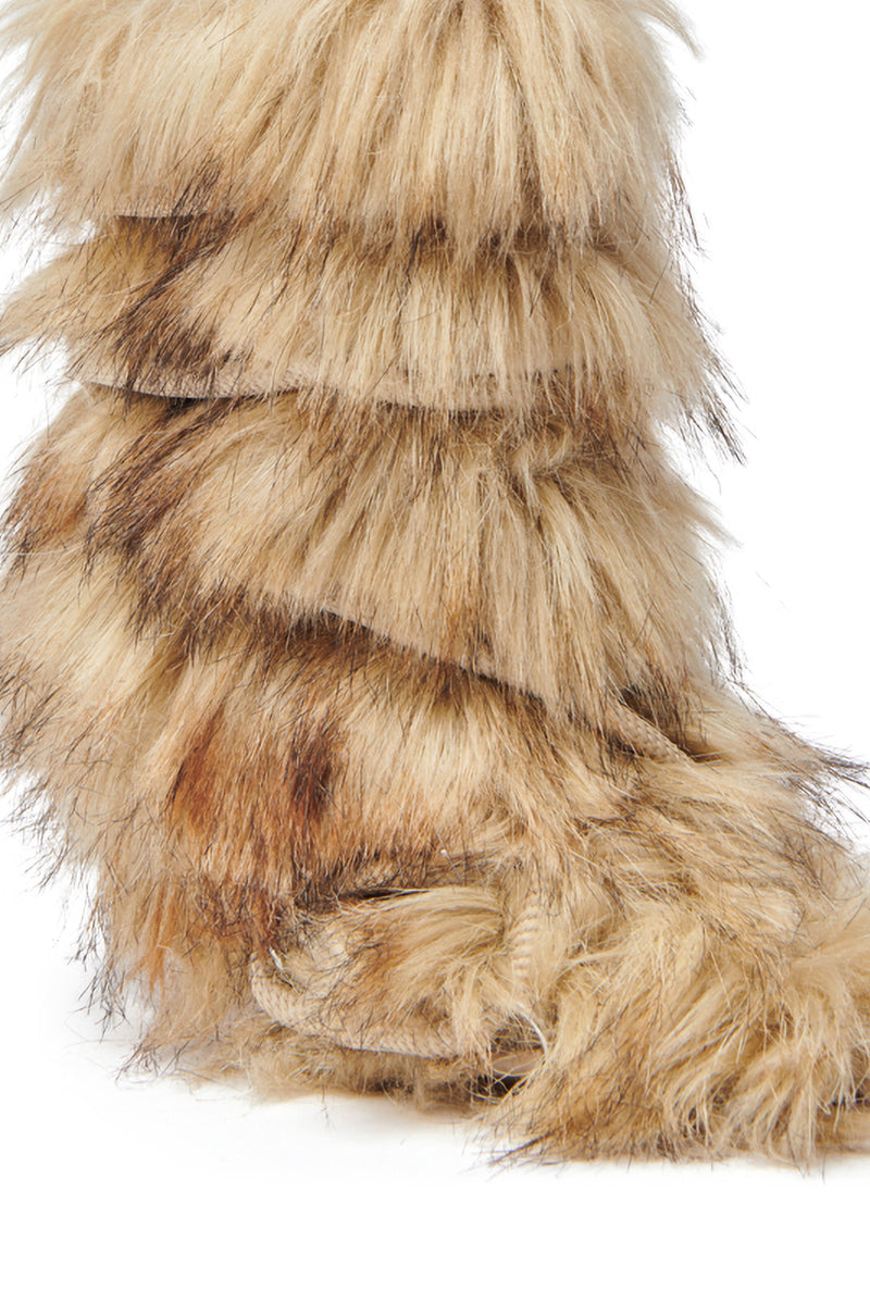 A close-up of the AZALEA WANG SALERE BROWN ROPE DETAIL STILETTO BOOTIE highlights its layered shaggy faux fur in light brown with dark patches, and distinct rope accents for an animal paw-inspired look.