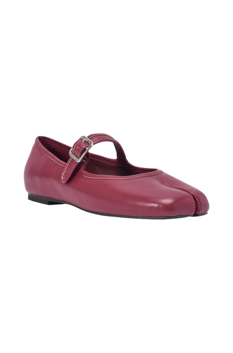 The AKIRA GOLD SANG BURGUNDY PU SPLIT TOE FLAT is a maroon Mary Jane shoe with a buckled strap and split toe design, displayed on a white background. 4