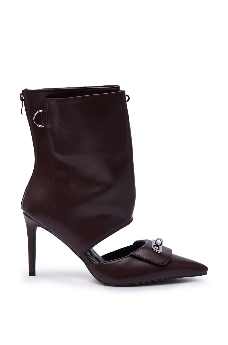 The AZALEA WANG SARVESH BROWN CUTOUT STILETTO BOOTIE features dark brown faux leather, a pointed toe, unique flap with metallic buckle, ankle-high soft upper with silver ring accent, back zipper, and modern cutout design. 3