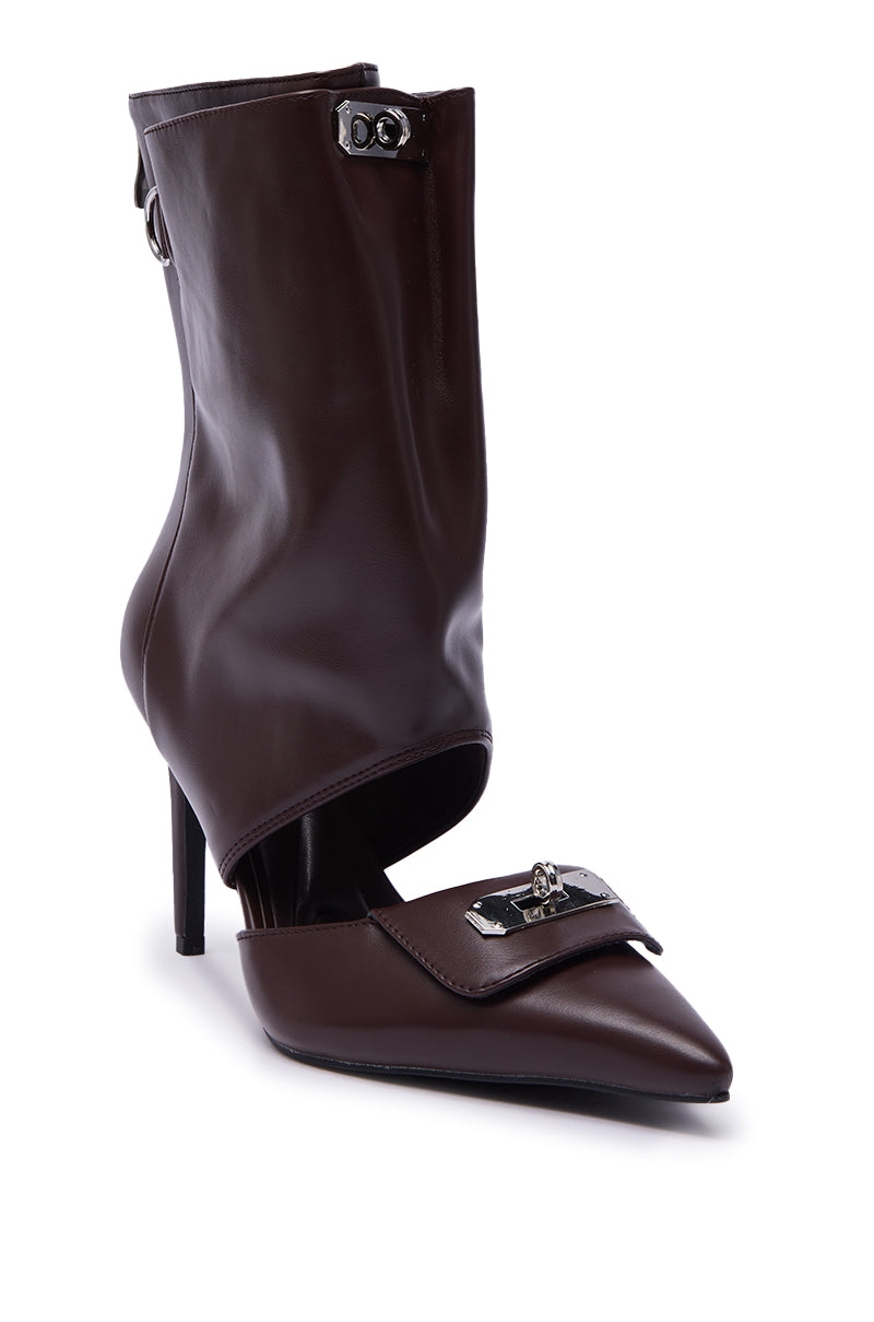 The AZALEA WANG SARVESH BROWN CUTOUT STILETTO BOOTIE is a stylish, dark brown faux leather bootie featuring a pointed toe, front strap with buckle detail, and a wide ankle cuff with metal clasp. 4
