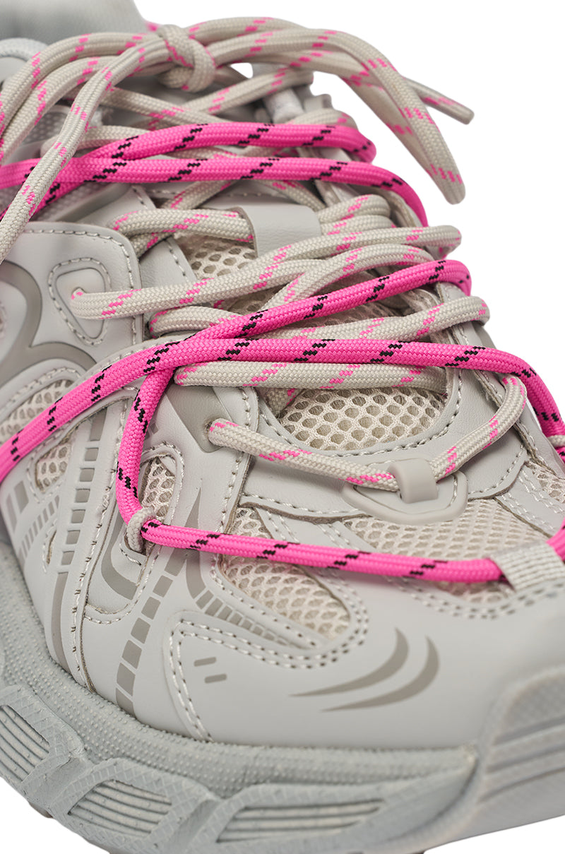 Close-up of the AZALEA WANG SATINE GREY LACE UP SNEAKER—a light gray chunky platform with a mesh and synthetic upper, bright pink and beige laces, intricate patterns, and a textured sole for bold, sporty-chic style. 8