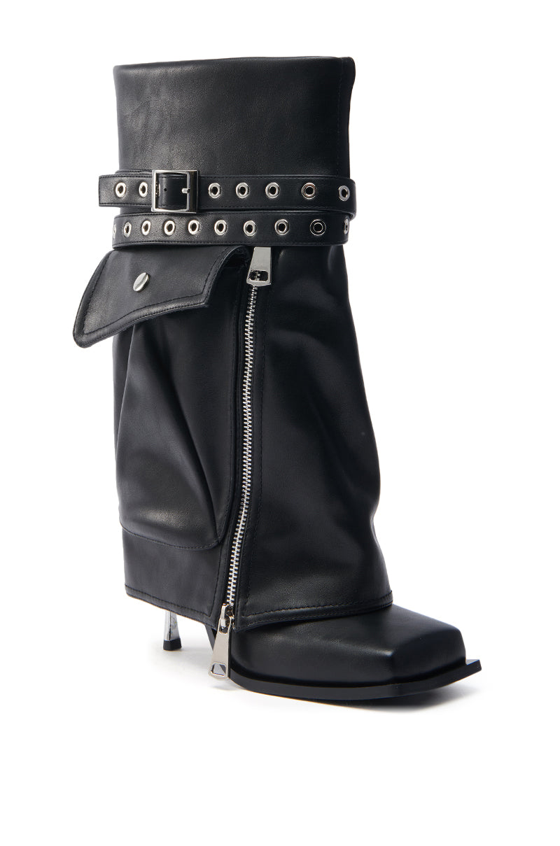 The AZALEA WANG SAYLAH Black Fold Over Stiletto Bootie features a square toe, decorative strap with eyelets and buckle, an asymmetrical diagonal zipper, and a slightly slouched shaft for an edgy, modern look.