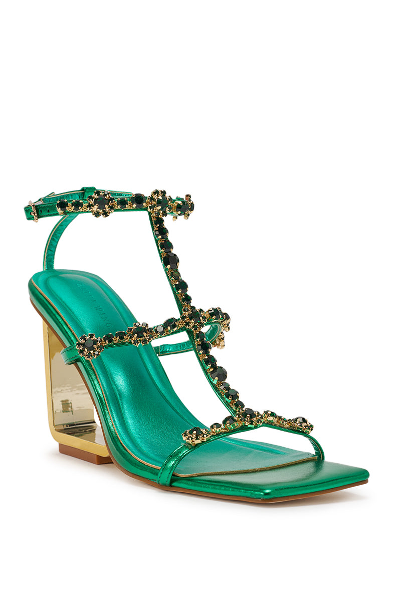 The AZALEA WANG SCHANTELLE Green Embellished Upper Wedge Sandal features a metallic green finish, jeweled gold and black straps, rhinestone-decorated heels, open toe, and an angled block heel with a gold accent. 3