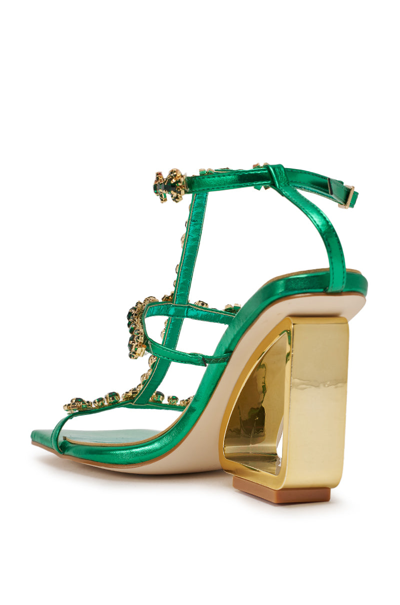 The AZALEA WANG SCHANTELLE Green Embellished Upper Wedge Sandal features crystal details, green straps, and a metallic gold wedge heel, shown from a back side angle. 4
