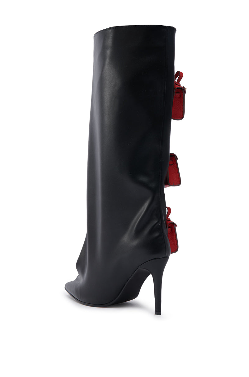The AZALEA WANG SCIPIO BLACK PURSE BOOT is a sleek black faux leather knee-high stiletto boot with a pointed toe and three small red pouches attached vertically along the back.
