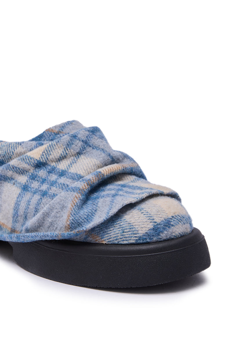 Close-up of the AZALEA WANG SEYMON Blue Multi Plaid Slip-On Ruched Flat, showcasing its blue and beige plaid fabric upper and thick black sole. 6