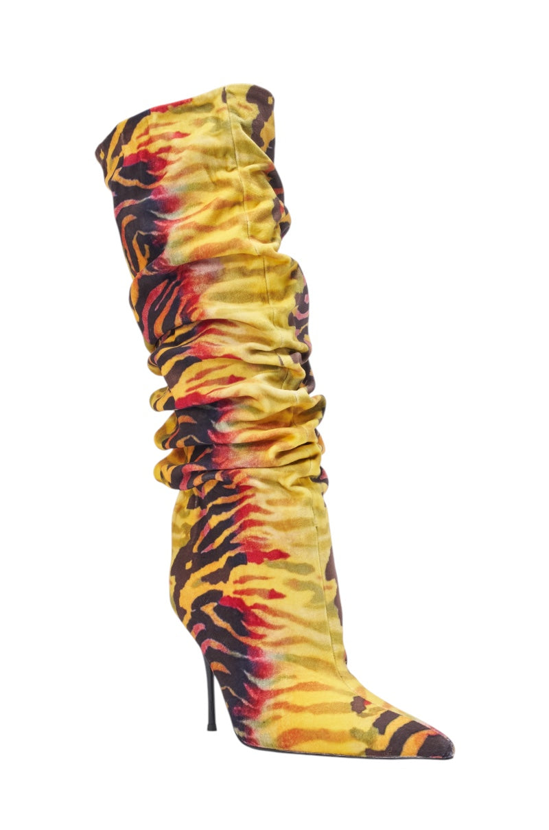 The AZALEA WANG SERIOUSLY TIGER SLOUCHY STILETTO BOOT is a knee-high, pointed-toe faux suede boot with a slouchy shaft and a bold yellow, orange, and black tiger print pattern. 4