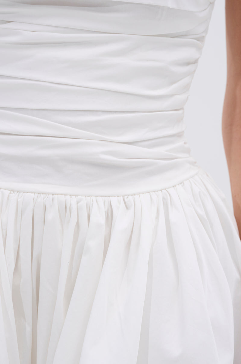 Close-up of the THIS AND THAT POPLIN HIGH LOW DRESS in white cotton, focusing on the ruched bodice and gathered voluminous skirt to showcase dress textures and construction details.