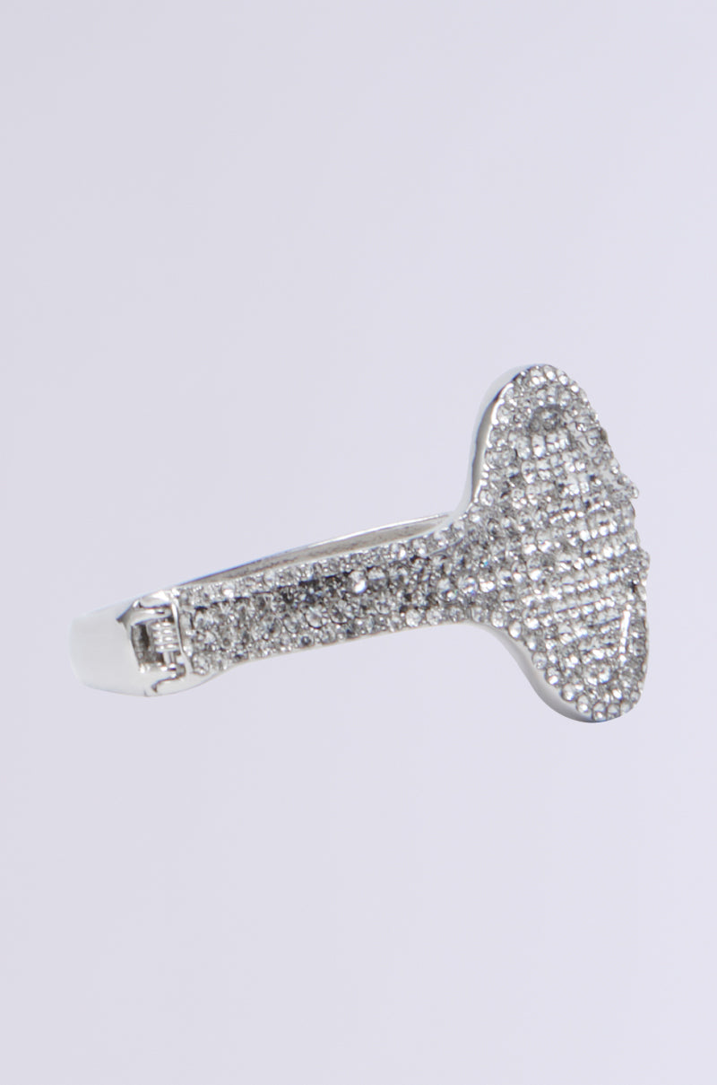 The FOR THE MET BRACELET is a silver bracelet with a wide, flat top featuring rhinestone detailing that sparkles against a plain white background.