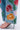 The INTO THE GARDEN FLORAL EMBROIDERED DENIM JEANS display striking red, orange, and pink embroidered flowers with green leaves on light-wash denim. These high-rise jeans pair seamlessly with high-heeled, open-toe sandals featuring thin straps.
