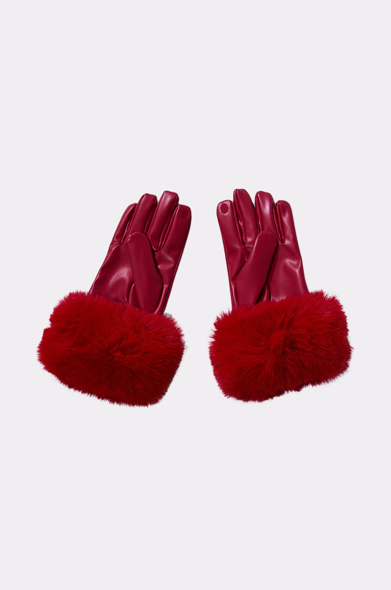 ALL I WANT IS MONEY RED FUR GLOVES: red leather touchscreen gloves featuring large, fluffy red faux fur cuffs, shown flat on a light background. 3