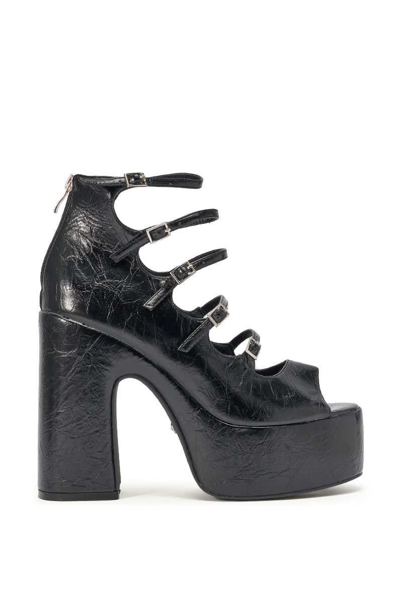 The AZALEA WANG SMITTEN BLACK PU STRAPPY BLOCK HEEL SANDAL features black faux leather, a chunky block heel, peep-toe design, five thin buckle straps, shiny textured finish, and a back zipper for easy wear. 4
