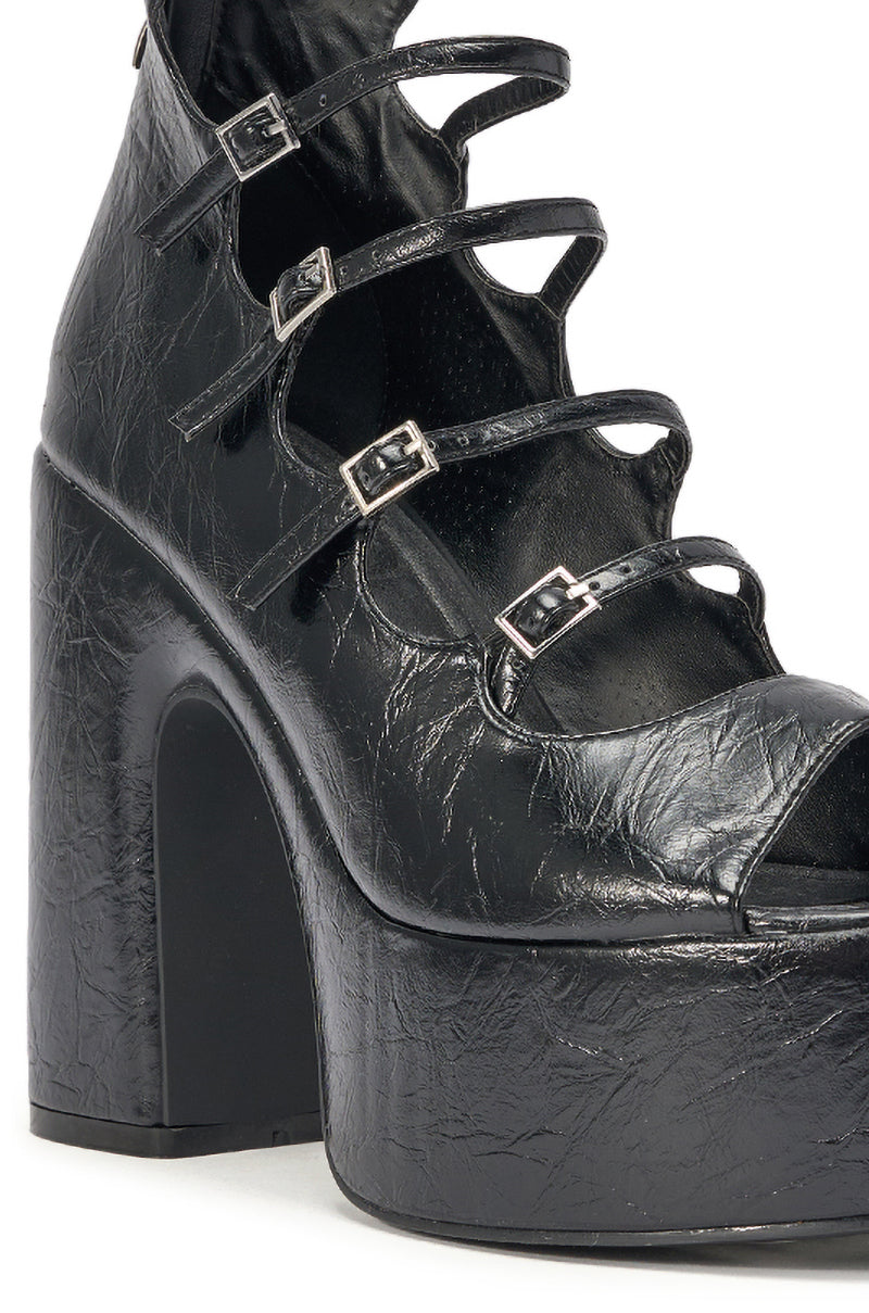 Close-up of the AZALEA WANG SMITTEN BLACK PU STRAPPY BLOCK HEEL SANDAL, showcasing textured black faux leather, four thin front buckle straps, and an ankle strap for support. 7