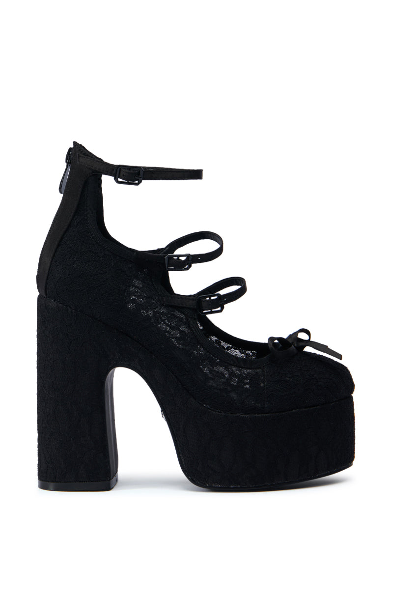 The AZALEA WANG SPROUT BLACK PUMP is a platform shoe boasting a high, chunky heel and covered in textured fabric. It features multiple thin straps with buckles, a closed toe design, and an elegant lace upper. Additionally, the comfort cushion insole ensures long-lasting wearability.