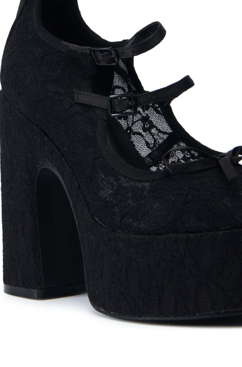 Close-up of the AZALEA WANG SPROUT BLACK PUMP showcasing its intricate lace upper. This black high-heeled shoe features a chunky heel and platform, complemented by three thin straps across the top secured with small buckles. The comfort cushion insole combines elegance and Gothic-inspired style, offering a design that's both fashionable and comfortable.