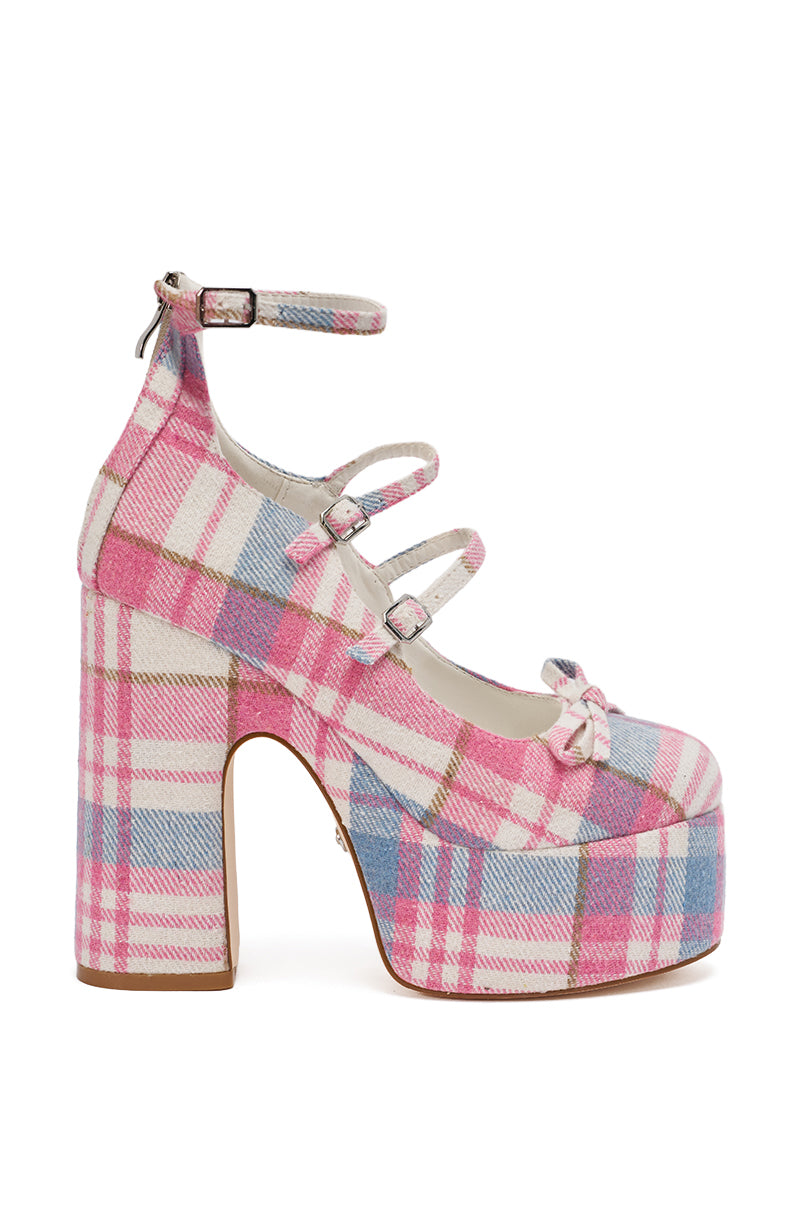 The AZALEA WANG SPROUT PINK PLAID CHUNKY PUMP features a chunky heel, three straps, a small bow on the toe, and pink, white, and blue plaid fabric—adding playful charm to any look. 4