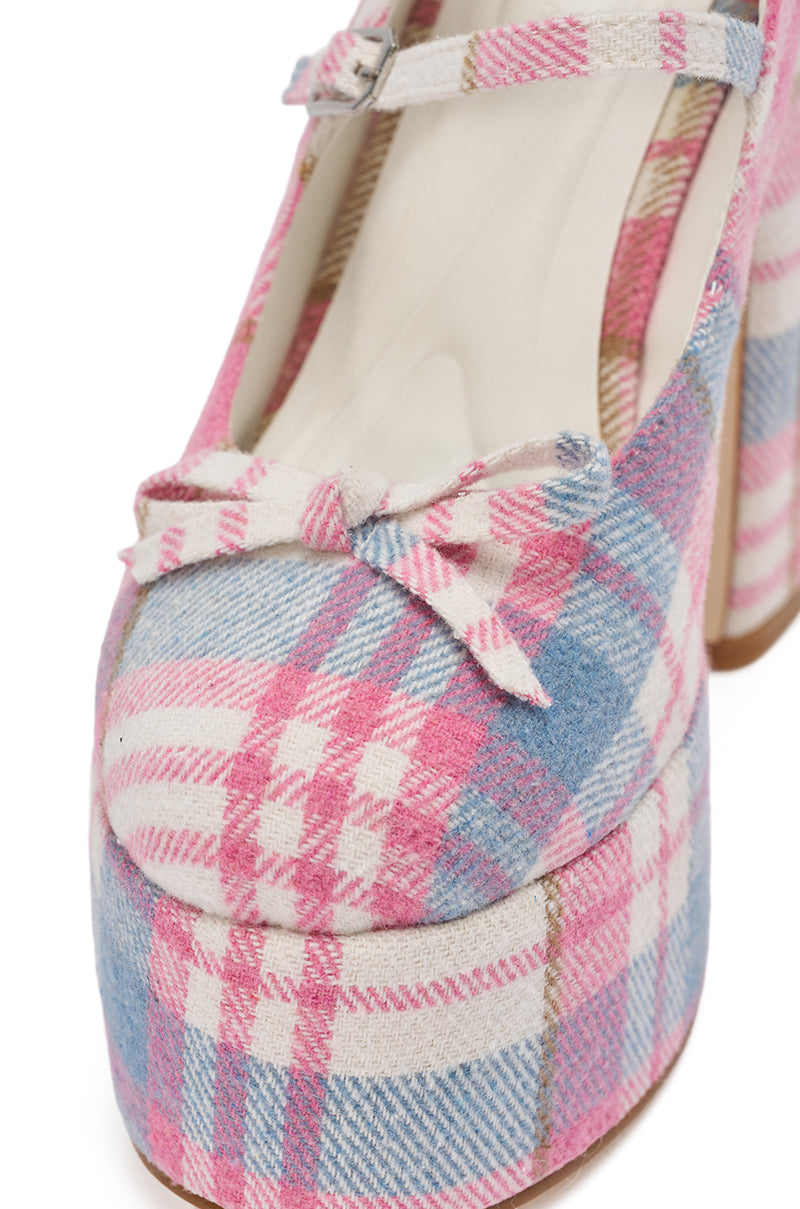 Close-up of the AZALEA WANG SPROUT PINK PLAID CHUNKY PUMP, a platform shoe with a front bow, top strap, and comfort cushion insole. 7