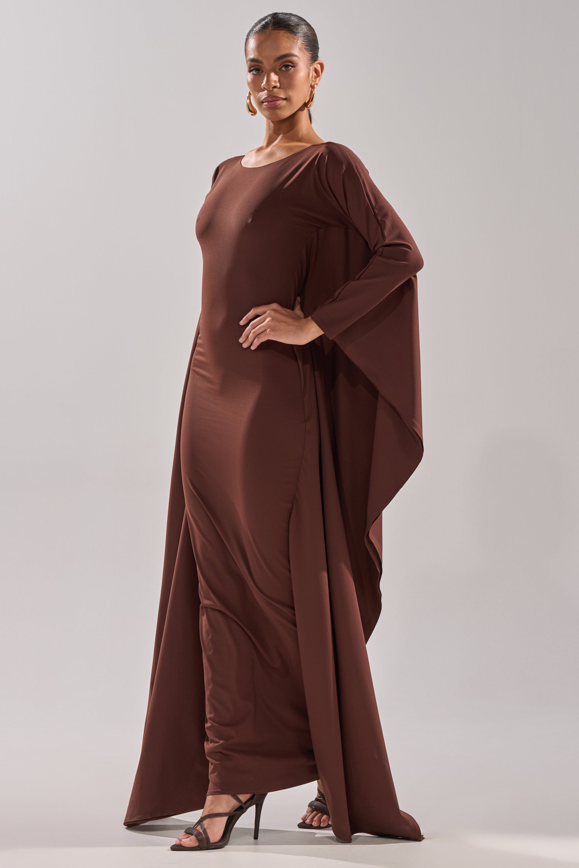 KYLIE MAXI DRESS WITH RUFFLE SLEEVES IN BROWN AKIRA KYLIE MAXI DRESS WITH RUFFLE SLEEVES IN BROWN AKIRA
