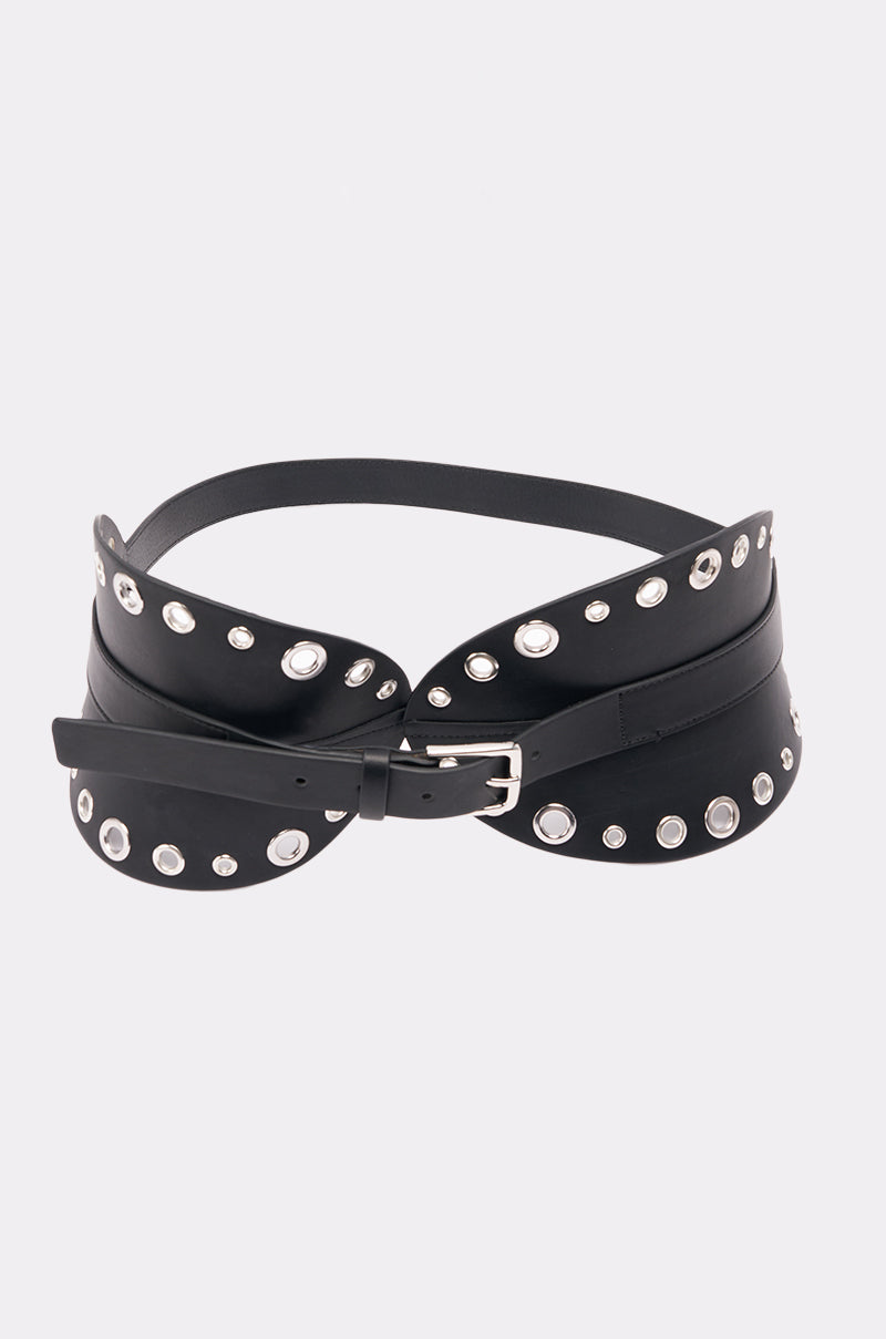 The CINCH IT BELT is a wide black faux leather waist belt featuring silver grommet accents and a sleek silver buckle, shown against a plain white background. 3