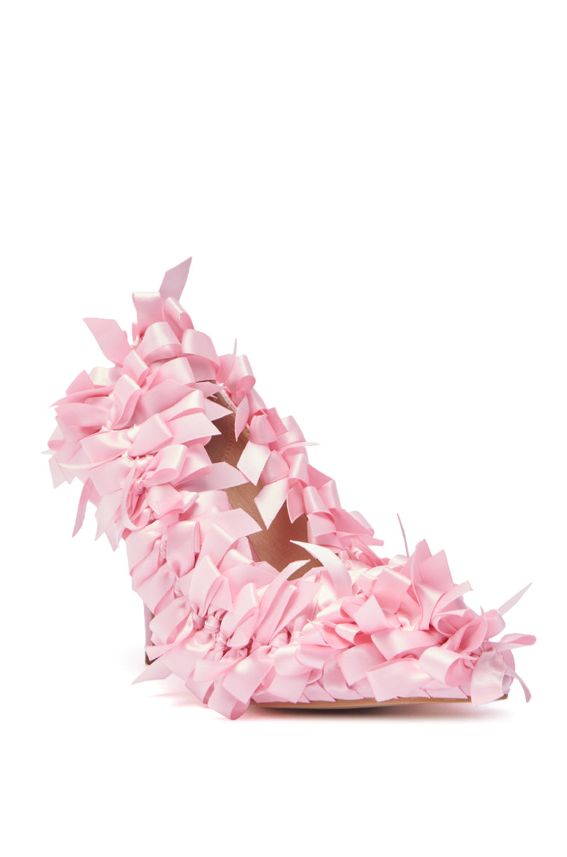 The AZALEA WANG STACIA PINK BOW PUMP features a stiletto heel, pink bow embellishments, and a decorative satin design for a soft, whimsical look.