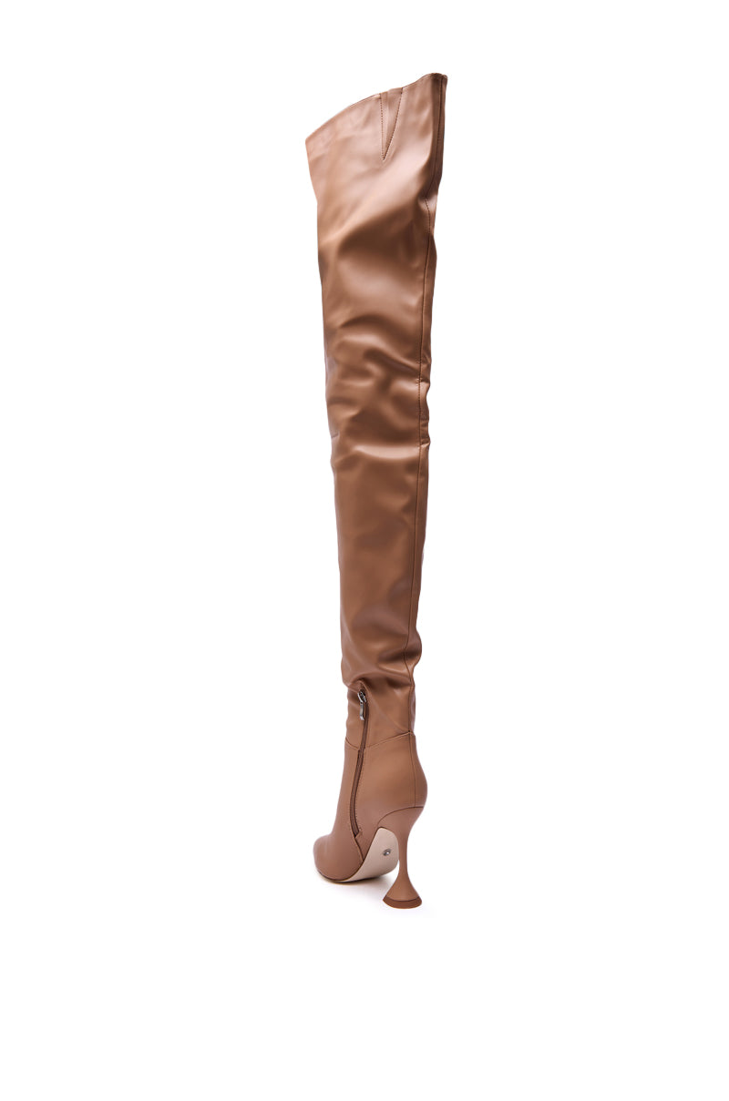 The AZALEA WANG STEPHAN Beige PU Flared Heel Ruched Boot features a pointed toe, faux leather finish, visible zipper, and sculptural heel, displayed over a white background.